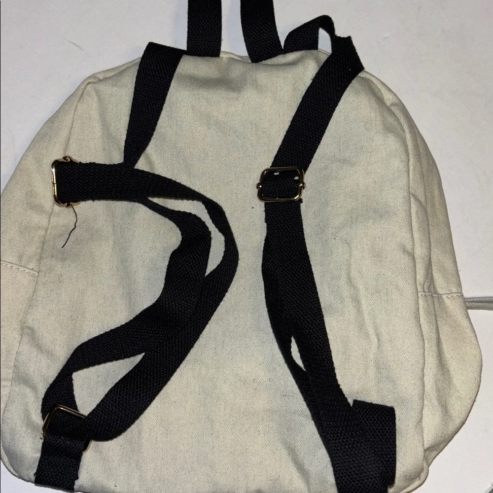ATMOSPHERE BRAND OFF WHITE DENIM BACKPACK WITH BUTTERFLY PATCH DESIGN   PRELOVED